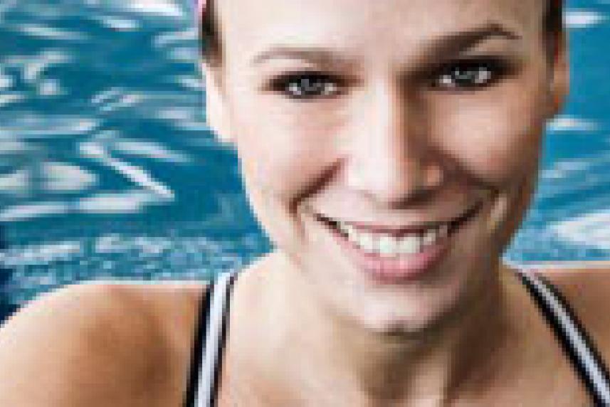 Photo: Smiling woman in swimming pool