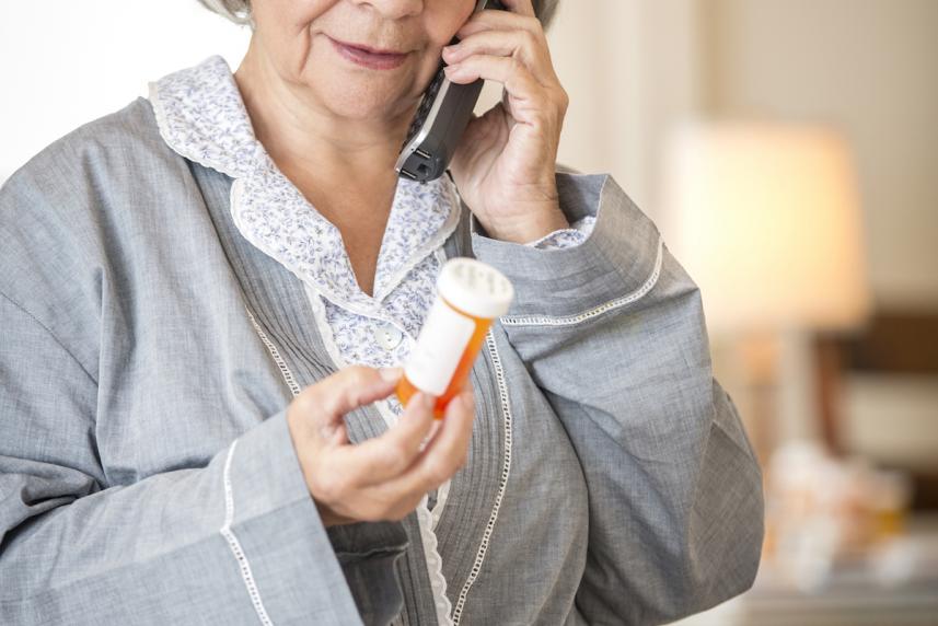 Older woman calling for prescriptions 