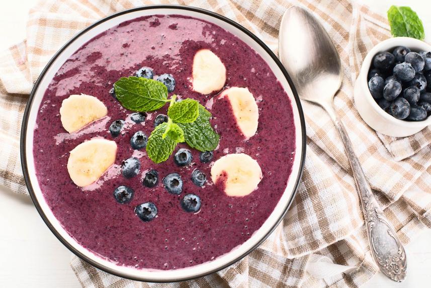 Photo: Blueberry Smoothie Bowl with spoon and small bowl of additional blueberries.
