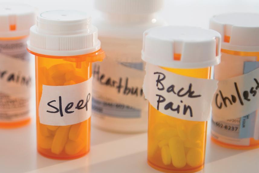 Photo: Assortment of prescription pill bottles.