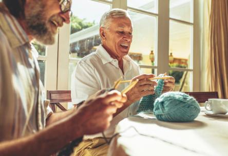 older couple playing with clay