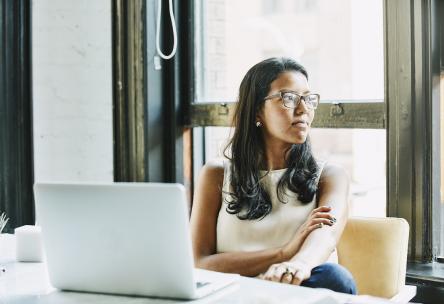 woman working next to window