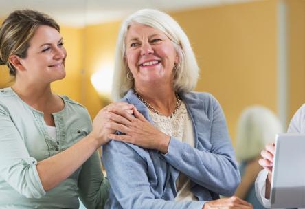 older woman with young adult daughter at the doctors