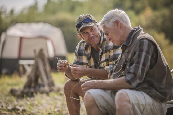 Photo: two men at a campground